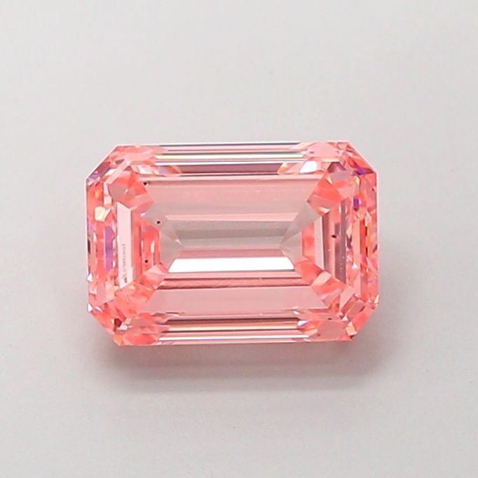 Loose Diamond - EMERALD 2.19ct Fancy Vivid Pink VS2: Loose Diamond - EMERALD 2.19ct Fancy Vivid Pink VS2 Source: This is a real non-mined Diamond that has been grown in a lab Shape: EMERALD Carats: 2.19 Color: Fancy Vivid Pink Certification: IGI Video: