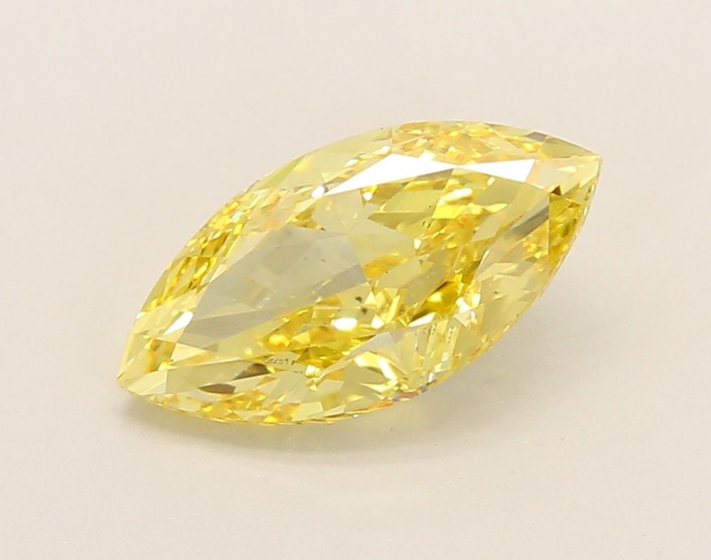 Loose Diamond - MARQUISE 2.08ct Fancy Vivid Yellow VS2: Loose Diamond - MARQUISE 2.08ct Fancy Vivid Yellow VS2 Source: This is a real non-mined Diamond that has been grown in a lab Shape: MARQUISE Carats: 2.08 Color: Fancy Vivid Yellow Certification: IGI V