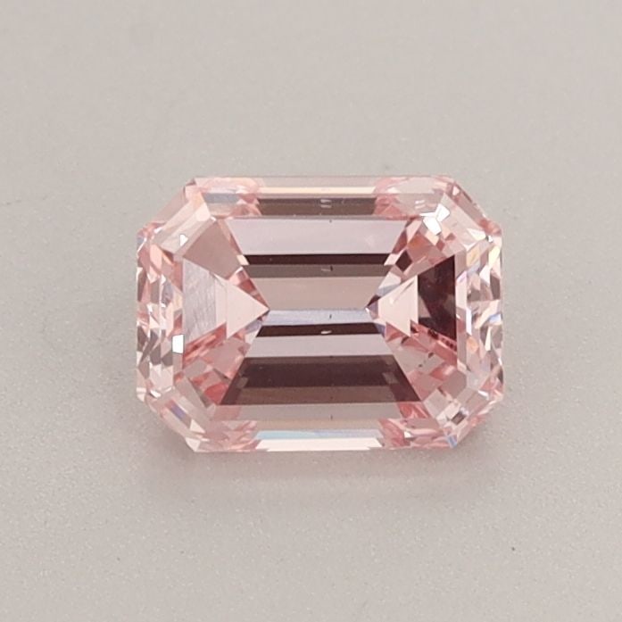 Loose Diamond - EMERALD 0.7ct Fancy Intense Pink VS2: Loose Diamond - EMERALD 0.7ct Fancy Intense Pink VS2 Source: This is a real non-mined Diamond that has been grown in a lab Shape: EMERALD Carats: 0.7 Color: Fancy Intense Pink Certification: IGI Video