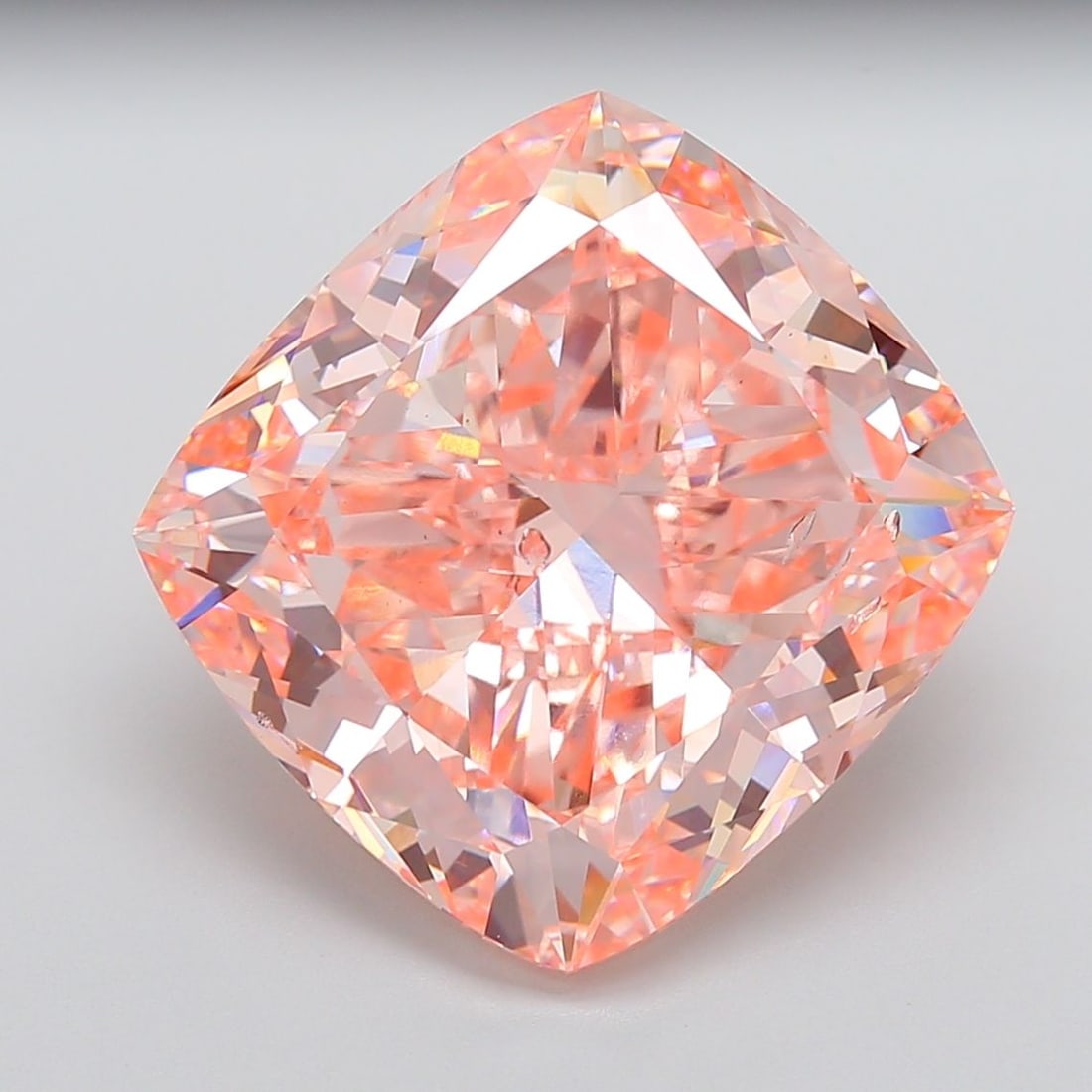 Loose Diamond - CUSHION MODIFIED 22.15ct Fancy Vivid Pink SI1: Loose Diamond - CUSHION MODIFIED 22.15ct Fancy Vivid Pink SI1 Source: This is a real non-mined Diamond that has been grown in a lab Shape: CUSHION MODIFIED Carats: 22.15 Color: Fancy Vivid Pink Certif