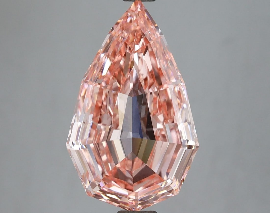 Loose Diamond - PEAR 4.05ct Fancy Vivid Pink VVS2: Loose Diamond - PEAR 4.05ct Fancy Vivid Pink VVS2 Source: This is a real non-mined Diamond that has been grown in a lab Shape: PEAR Carats: 4.05 Color: Fancy Vivid Pink Certification: IGI Video: