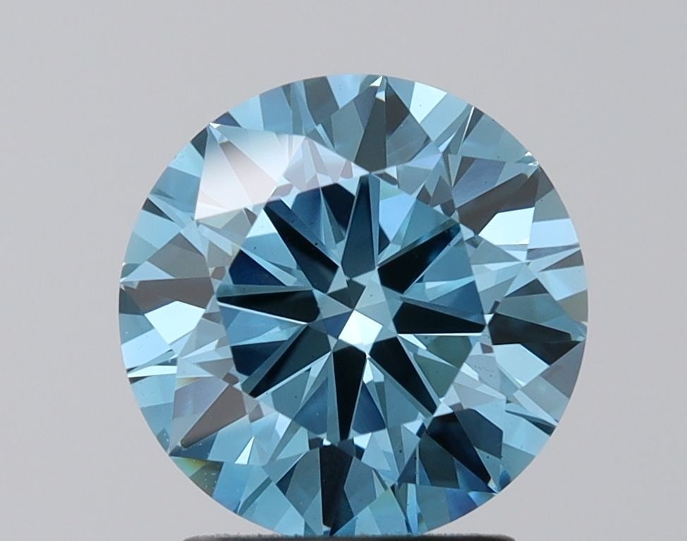 Loose Diamond - ROUND 2.12ct Fancy Vivid Blue VS1: Loose Diamond - ROUND 2.12ct Fancy Vivid Blue VS1 Source: This is a real non-mined Diamond that has been grown in a lab Shape: ROUND Carats: 2.12 Color: Fancy Vivid Blue Certification: IGI The Diamond