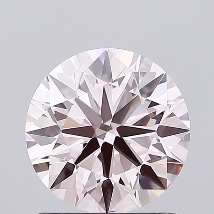 Ideal Loose Diamond - ROUND 1.2ct Fancy Light Pink VS1: Ideal Loose Diamond - ROUND 1.2ct Fancy Light Pink VS1 Source: This is a real non-mined Diamond that has been grown in a lab Shape: ROUND Carats: 1.2 Color: Fancy Light Pink Certification: IGI Video: