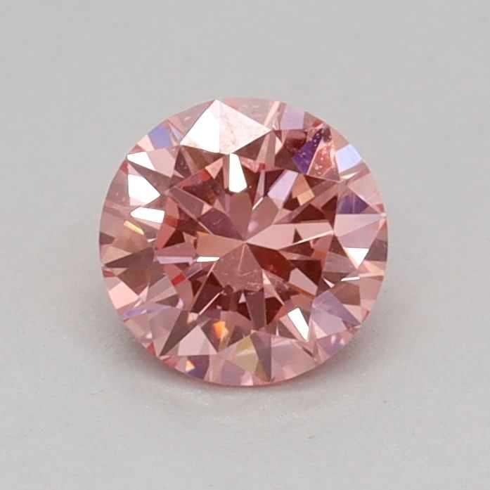 Loose Diamond - ROUND 0.31ct Fancy Vivid Pink VS1: Loose Diamond - ROUND 0.31ct Fancy Vivid Pink VS1 Source: This is a real non-mined Diamond that has been grown in a lab Shape: ROUND Carats: 0.31 Color: Fancy Vivid Pink Certification: IGI Video: