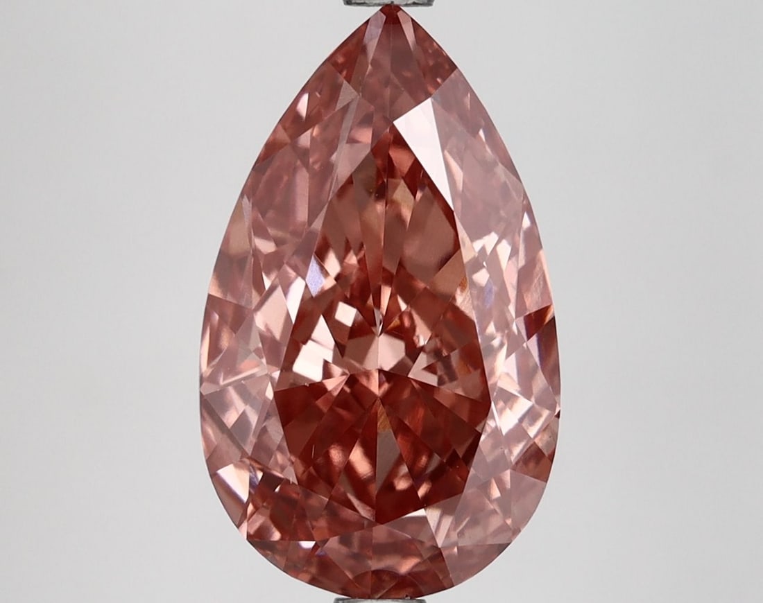 Loose Diamond - PEAR 4.71ct Fancy Vivid Pink VS1: Loose Diamond - PEAR 4.71ct Fancy Vivid Pink VS1 Source: This is a real non-mined Diamond that has been grown in a lab Shape: PEAR Carats: 4.71 Color: Fancy Vivid Pink Certification: IGI Video: