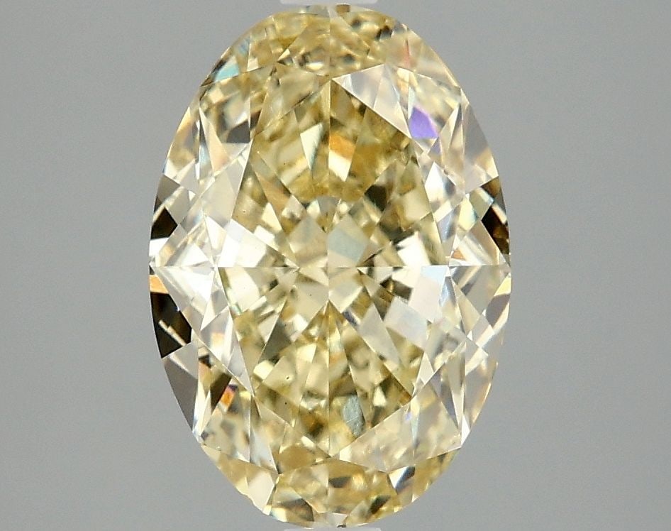 Loose Diamond - OVAL 3.1ct Fancy Intense Yellow VS1: Loose Diamond - OVAL 3.1ct Fancy Intense Yellow VS1 Source: This is a real non-mined Diamond that has been grown in a lab Shape: OVAL Carats: 3.1 Color: Fancy Intense Yellow Certification: IGI Video: