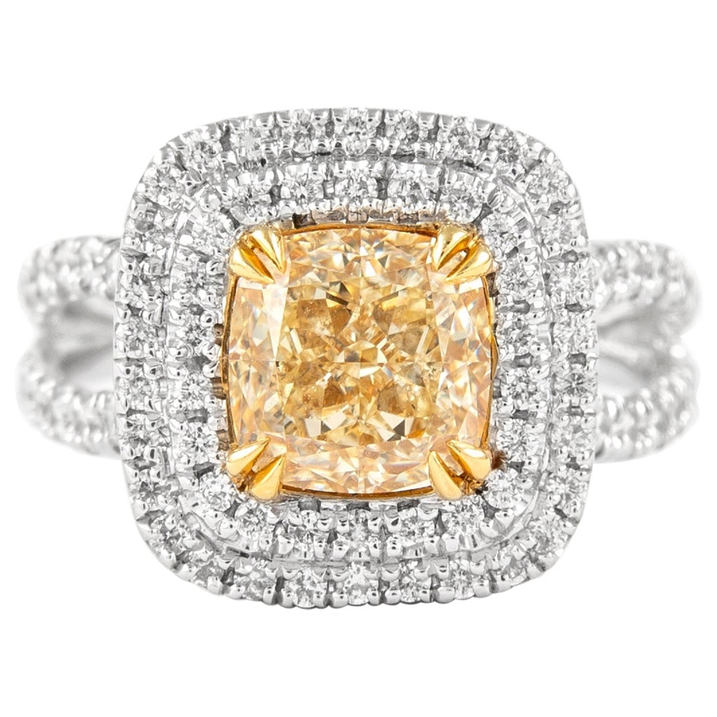 2.11ct Fancy Intense Yellow Diamond Ring 18k Gold EGL Certified: 2.11ct Fancy Intense Yellow Diamond Ring 18k Gold EGL Certified This stunning modern ring features a 2.11 ct Fancy Intense Yellow VS2 cushion cut diamond, EGL graded, set in a beautiful double halo de