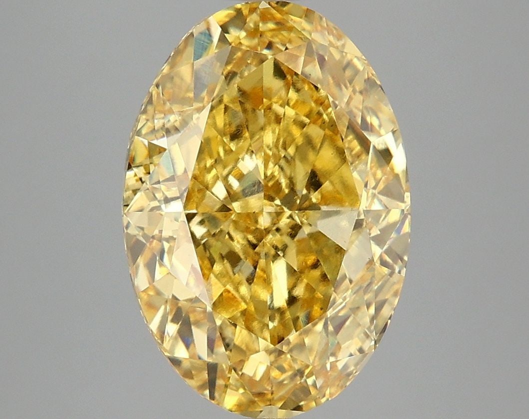 Loose Diamond - OVAL 4.96ct Fancy Vivid Yellow VS1: Loose Diamond - OVAL 4.96ct Fancy Vivid Yellow VS1 Source: This is a real non-mined Diamond that has been grown in a lab Shape: OVAL Carats: 4.96 Color: Fancy Vivid Yellow Certification: IGI Video: