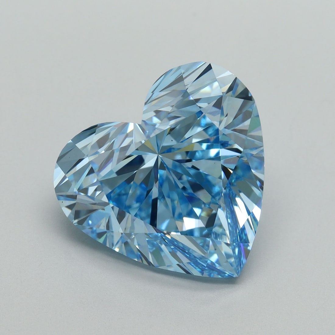 Loose Diamond - HEART 9.32ct Fancy Vivid Blue VS1: Loose Diamond - HEART 9.32ct Fancy Vivid Blue VS1 Source: This is a real non-mined Diamond that has been grown in a lab Shape: HEART Carats: 9.32 Color: Fancy Vivid Blue Certification: IGI Video: