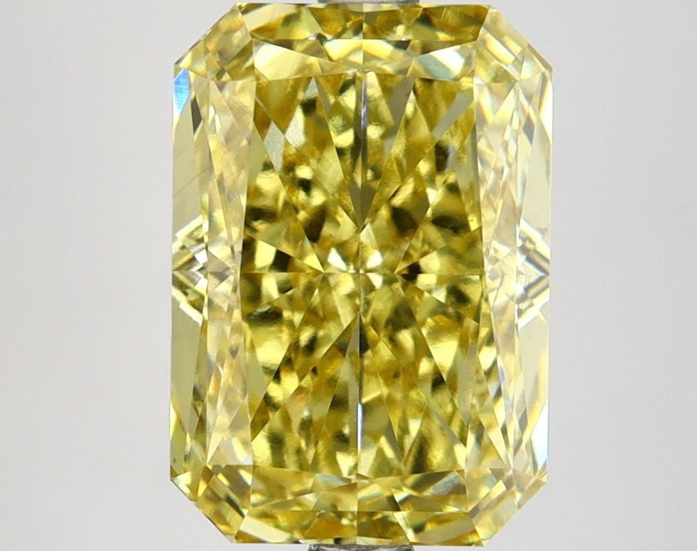 Loose Diamond - RADIANT 4.04ct Fancy Vivid Yellow VS1: Loose Diamond - RADIANT 4.04ct Fancy Vivid Yellow VS1 Source: This is a real non-mined Diamond that has been grown in a lab Shape: RADIANT Carats: 4.04 Color: Fancy Vivid Yellow Certification: IGI Vid
