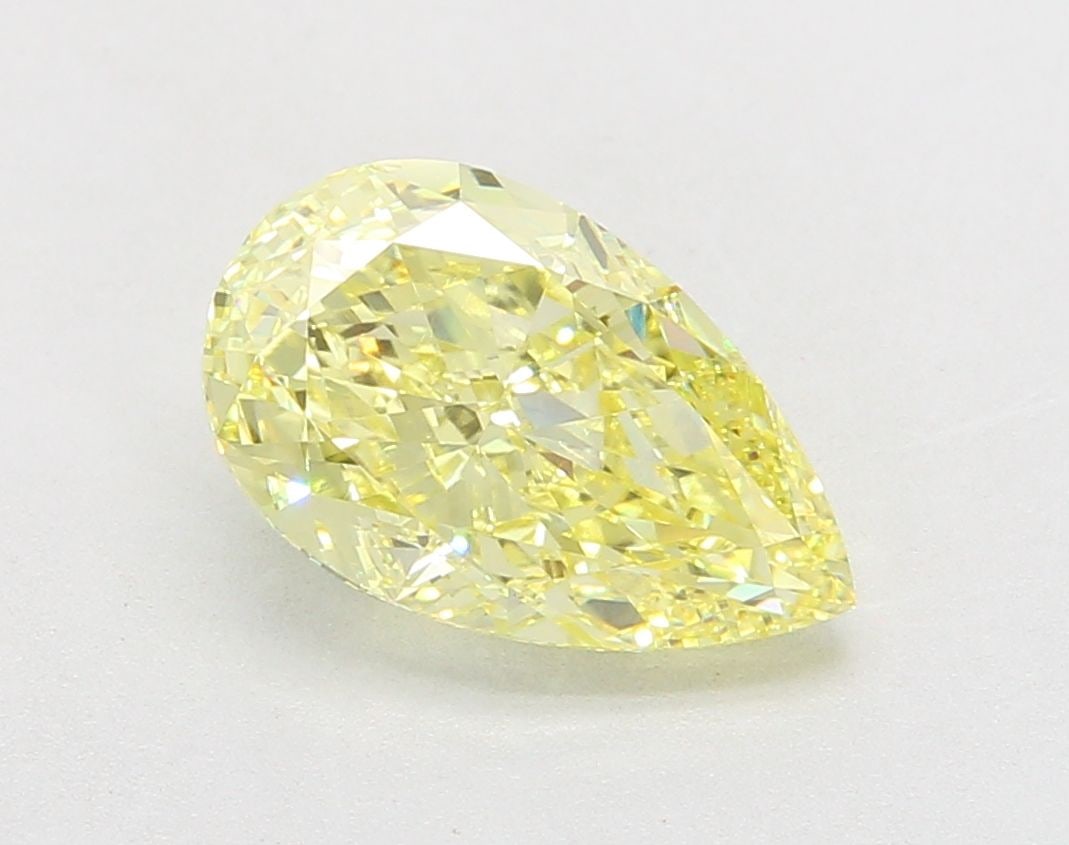 Loose Diamond - PEAR 3.09ct Fancy Intense Yellow VVS2: Loose Diamond - PEAR 3.09ct Fancy Intense Yellow VVS2 Source: This is a real non-mined Diamond that has been grown in a lab Shape: PEAR Carats: 3.09 Color: Fancy Intense Yellow Certification: IGI Vide