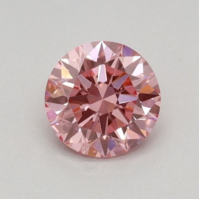 Loose Diamond - ROUND 0.44ct Fancy Vivid Pink VVS2: Loose Diamond - ROUND 0.44ct Fancy Vivid Pink VVS2 Source: This is a real non-mined Diamond that has been grown in a lab Shape: ROUND Carats: 0.44 Color: Fancy Vivid Pink Certification: IGI Video: