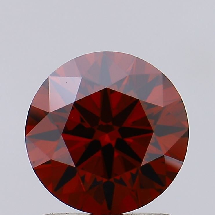 Ideal Loose Diamond - ROUND 1.24ct Fancy Deep Orange VVS2: Ideal Loose Diamond - ROUND 1.24ct Fancy Deep Orange VVS2 Source: This is a real non-mined Diamond that has been grown in a lab Shape: ROUND Carats: 1.24 Color: Fancy Deep Orange Certification: IGI Vi