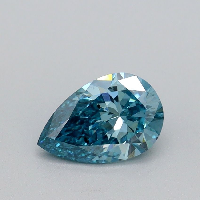 Loose Diamond - PEAR 0.65ct Fancy Vivid Blue SI1: Loose Diamond - PEAR 0.65ct Fancy Vivid Blue SI1 Source: This is a real non-mined Diamond that has been grown in a lab Shape: PEAR Carats: 0.65 Color: Fancy Vivid Blue Certification: IGI Video: