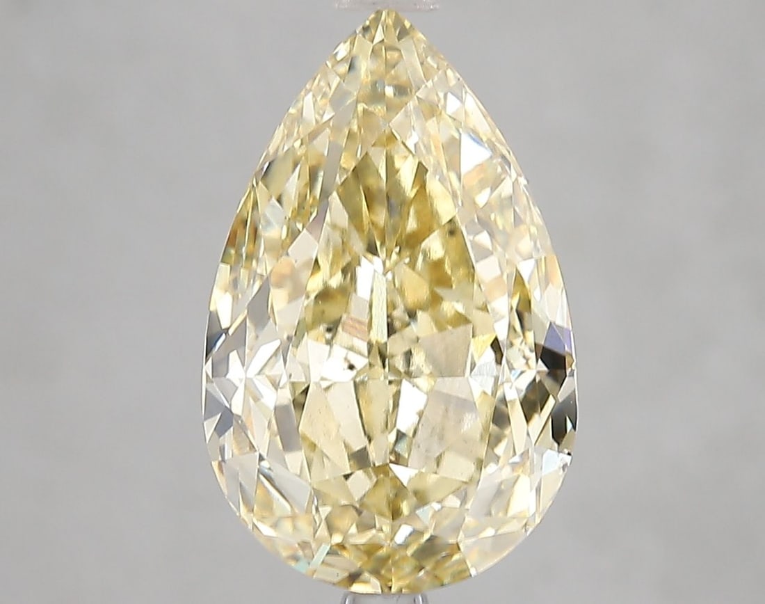 Loose Diamond - PEAR 5.26ct Fancy Intense Yellow VS2: Loose Diamond - PEAR 5.26ct Fancy Intense Yellow VS2 Source: This is a real non-mined Diamond that has been grown in a lab Shape: PEAR Carats: 5.26 Color: Fancy Intense Yellow Certification: IGI Video