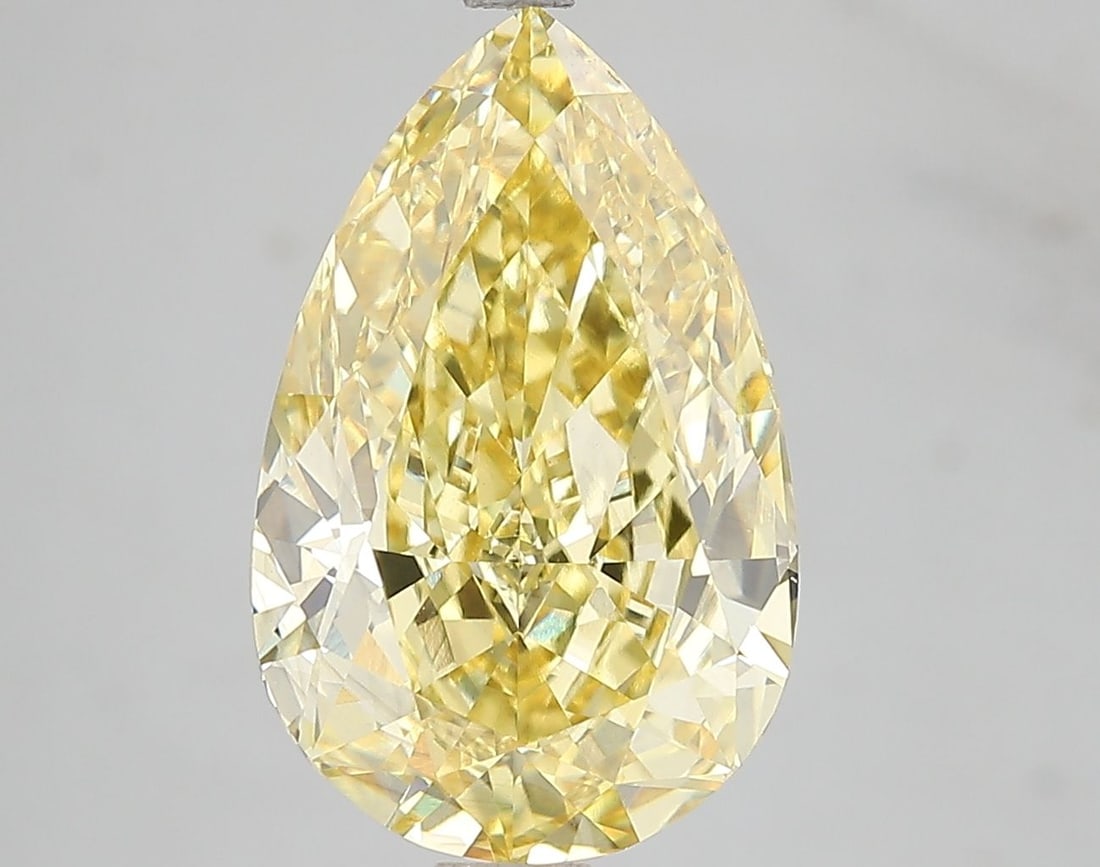 Loose Diamond - PEAR 5.11ct Fancy Vivid Yellow VS1: Loose Diamond - PEAR 5.11ct Fancy Vivid Yellow VS1 Source: This is a real non-mined Diamond that has been grown in a lab Shape: PEAR Carats: 5.11 Color: Fancy Vivid Yellow Certification: IGI Video:
