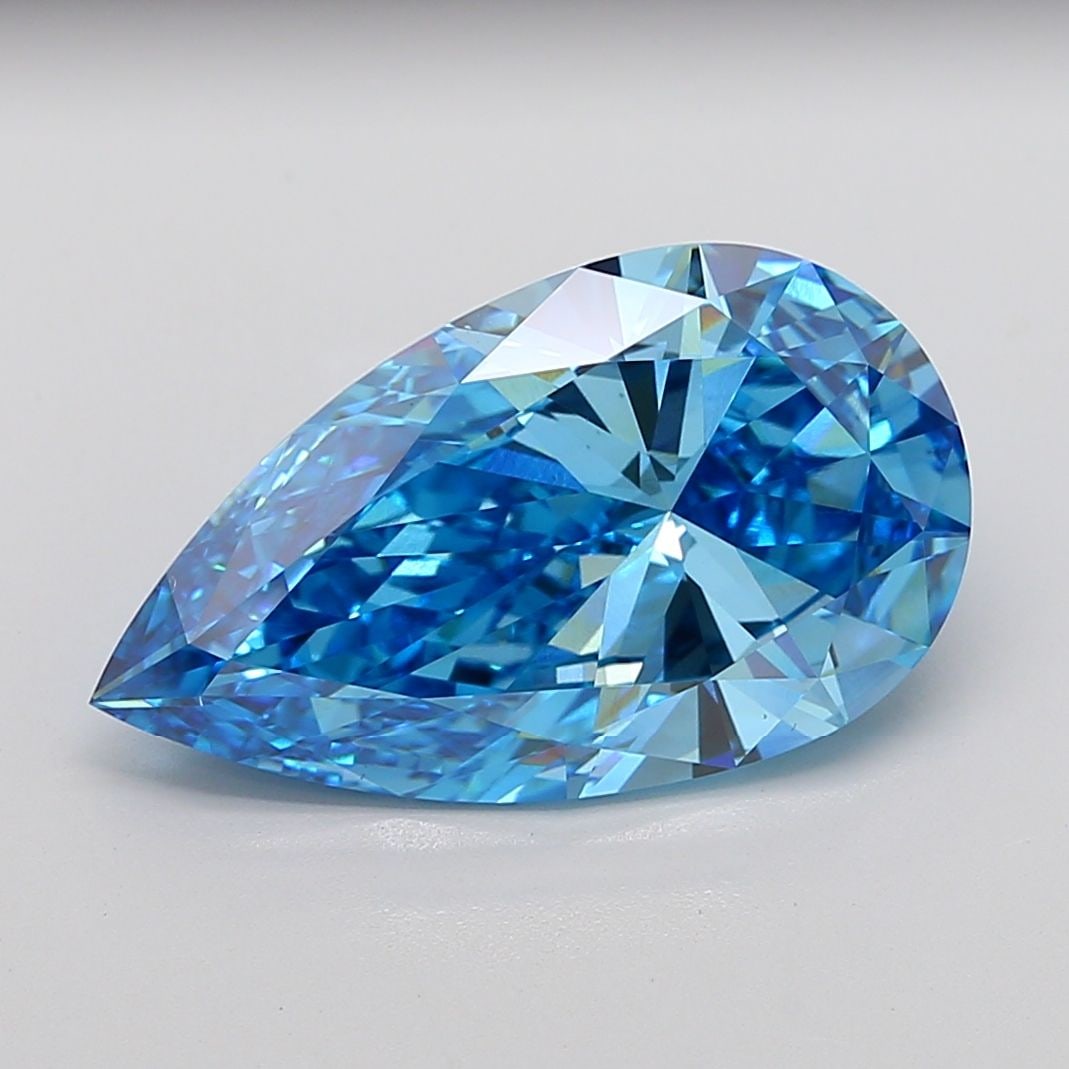 Loose Diamond - PEAR 10.11ct Fancy Vivid Blue VVS2: Loose Diamond - PEAR 10.11ct Fancy Vivid Blue VVS2 Source: This is a real non-mined Diamond that has been grown in a lab Shape: PEAR Carats: 10.11 Color: Fancy Vivid Blue Certification: IGI The Diamon