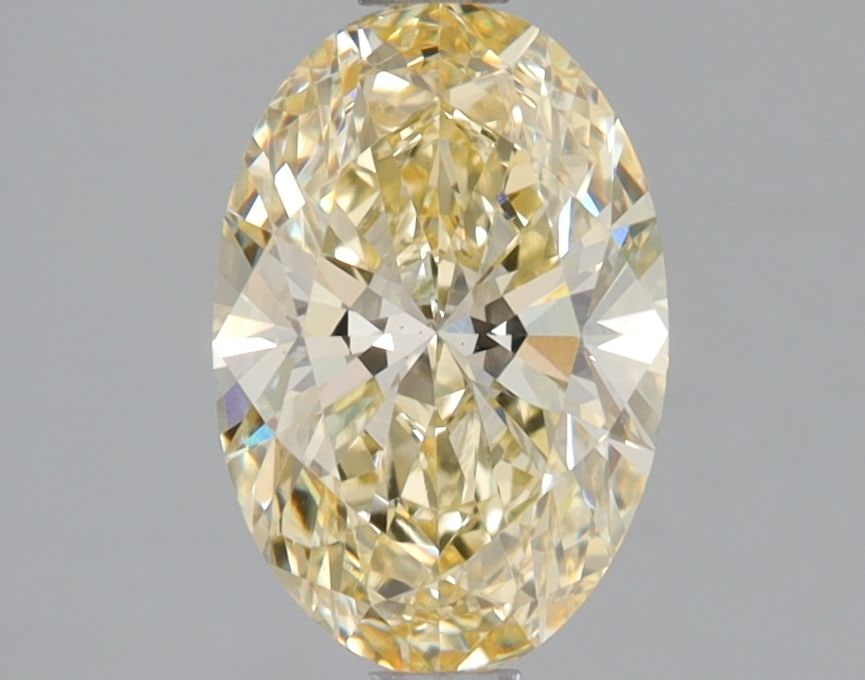Loose Diamond - OVAL 1.36ct Fancy Yellow VS1: Loose Diamond - OVAL 1.36ct Fancy Yellow VS1 Source: This is a real non-mined Diamond that has been grown in a lab Shape: OVAL Carats: 1.36 Color: Fancy Yellow Certification: IGI Video:
