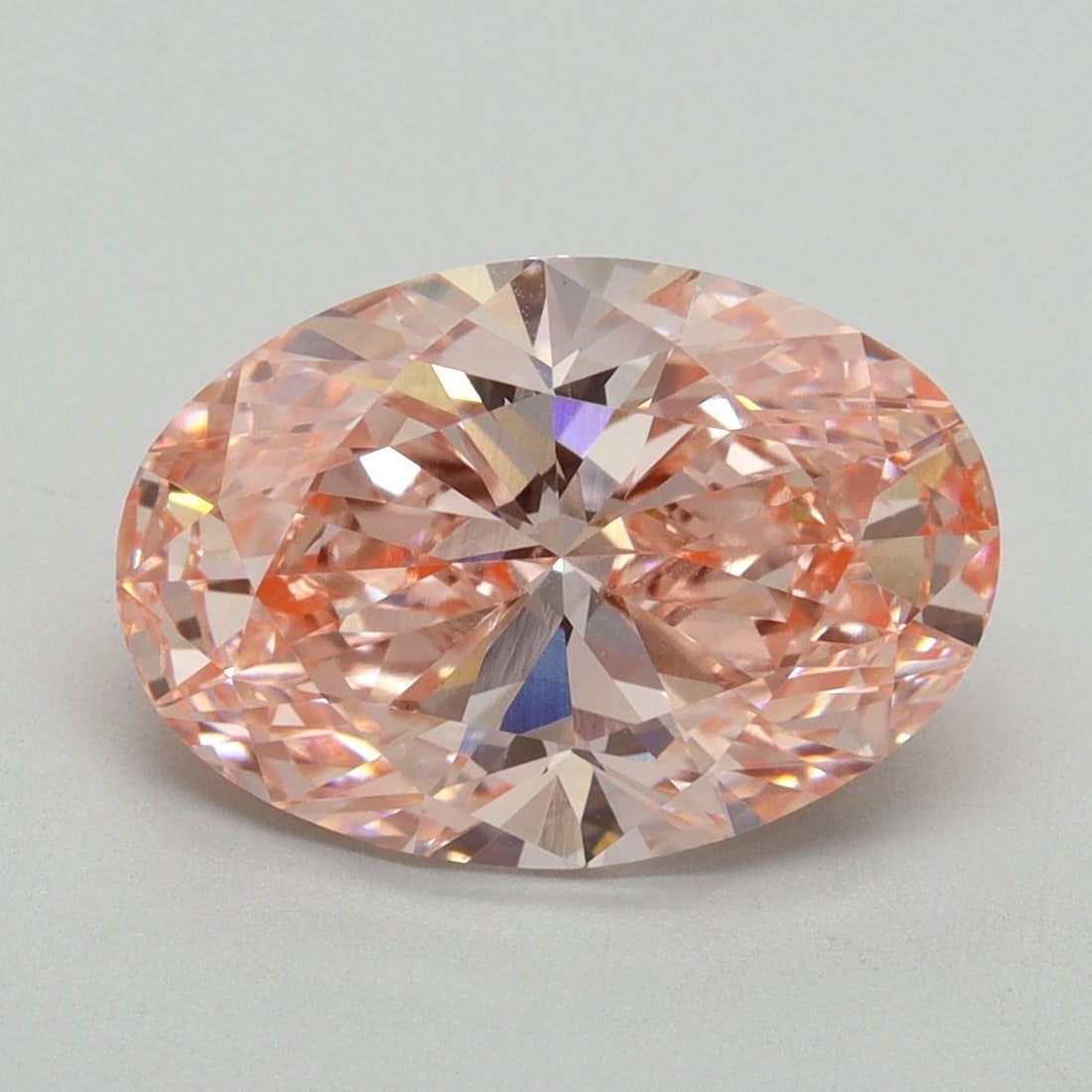 Loose Diamond - OVAL 4.05ct Fancy Vivid Pink VS1: Loose Diamond - OVAL 4.05ct Fancy Vivid Pink VS1 Source: This is a real non-mined Diamond that has been grown in a lab Shape: OVAL Carats: 4.05 Color: Fancy Vivid Pink Certification: IGI Video: