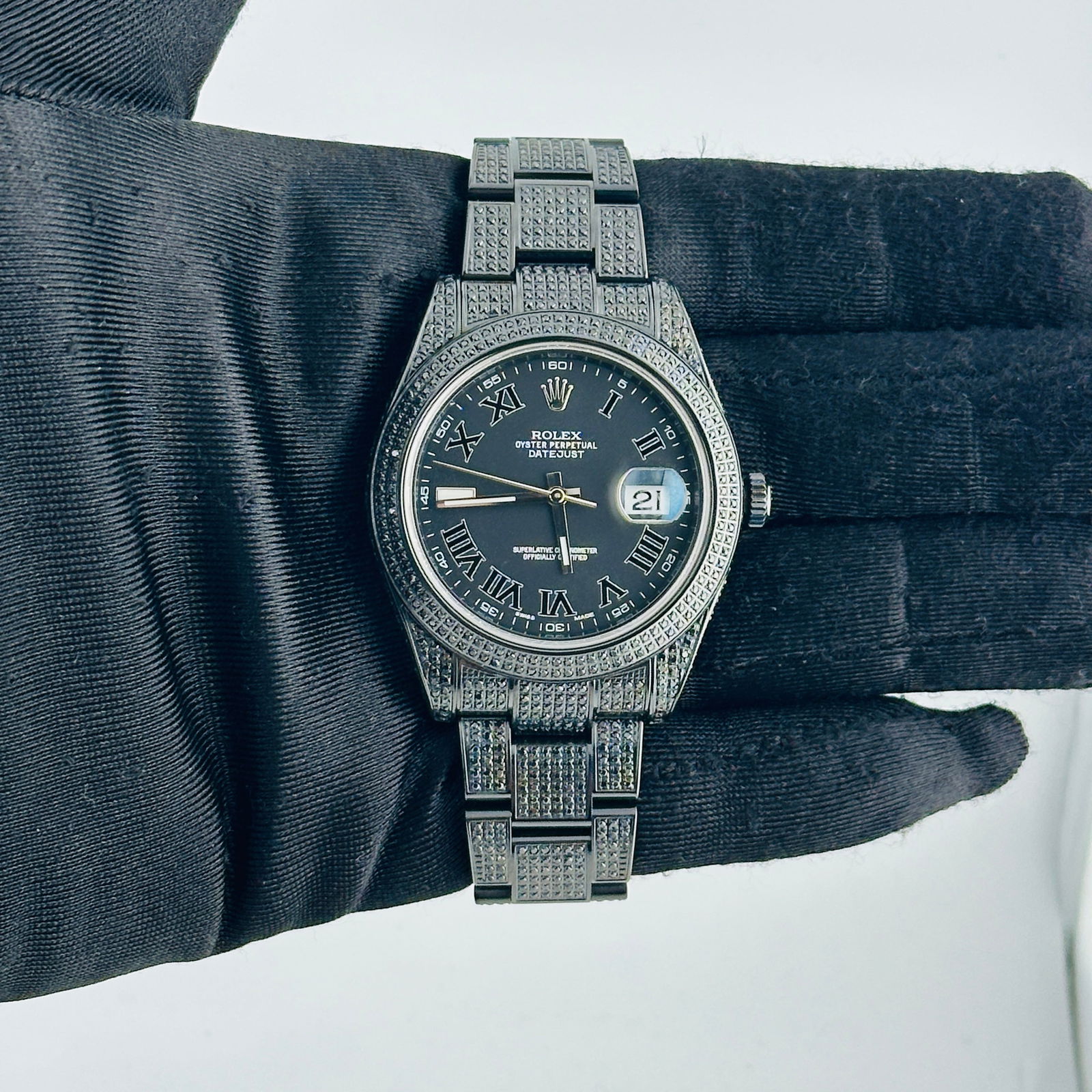 Rolex 116300 Datejust Mens Carbon Roman Dial Diamond Bezel Oyster 2017 Card: Rolex 116300 Datejust Mens Carbon Roman Dial Diamond Bezel Oyster 2017 Card This is a men's Rolex Datejust wristwatch, reference 116300, featuring a carbon Roman numeral dial. The bezel is set with di