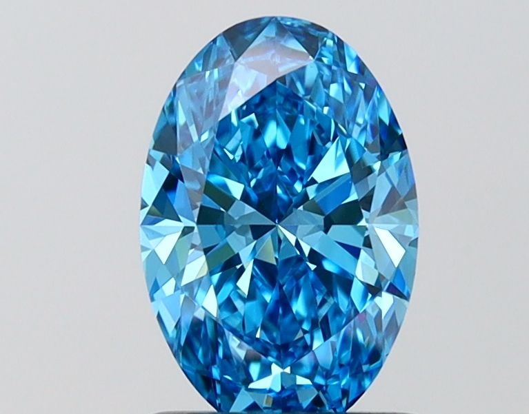 Loose Diamond - OVAL 1.27ct Fancy Vivid Blue VVS2: Loose Diamond - OVAL 1.27ct Fancy Vivid Blue VVS2 Source: This is a real non-mined Diamond that has been grown in a lab Shape: OVAL Carats: 1.27 Color: Fancy Vivid Blue Certification: IGI Video: