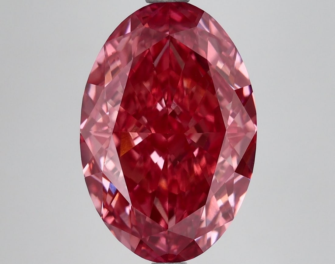 Loose Diamond - OVAL 7.07ct Fancy Vivid Pink VS1: Loose Diamond - OVAL 7.07ct Fancy Vivid Pink VS1 Source: This is a real non-mined Diamond that has been grown in a lab Shape: OVAL Carats: 7.07 Color: Fancy Vivid Pink Certification: IGI Video: