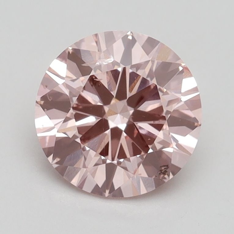 Loose Diamond - ROUND 1.4ct Fancy Intense Pink SI1: Loose Diamond - ROUND 1.4ct Fancy Intense Pink SI1 Source: This is a real non-mined Diamond that has been grown in a lab Shape: ROUND Carats: 1.4 Color: Fancy Intense Pink Certification: IGI Video: