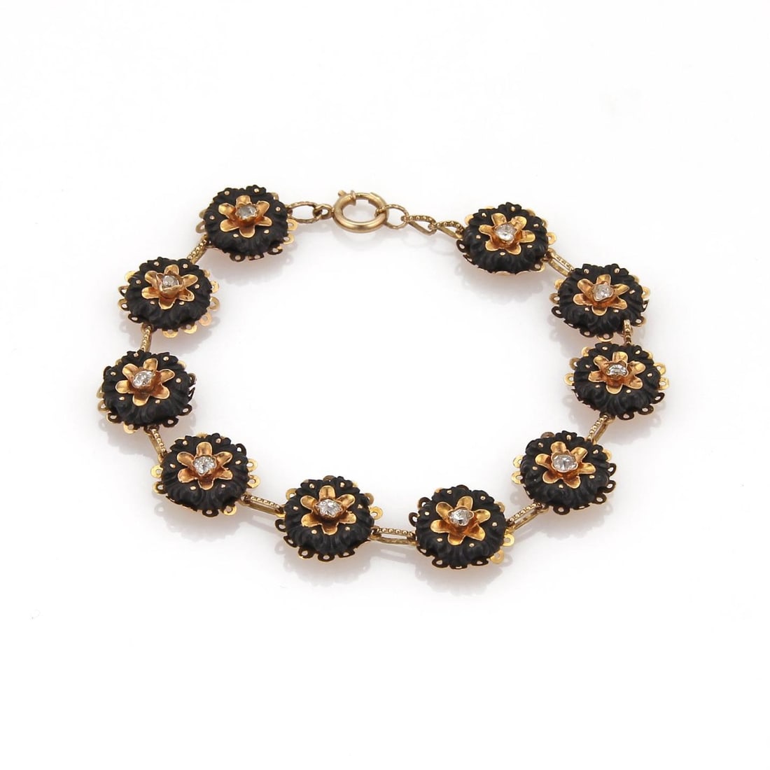 Victorian 18k Rose Gold Floral Bracelet with Coal Stone and Diamond: Victorian 18k Rose Gold Floral Bracelet with Coal Stone and Diamond This exquisite Victorian Era bracelet showcases a remarkable design crafted from 18k rose gold. It features ten intricately carved r