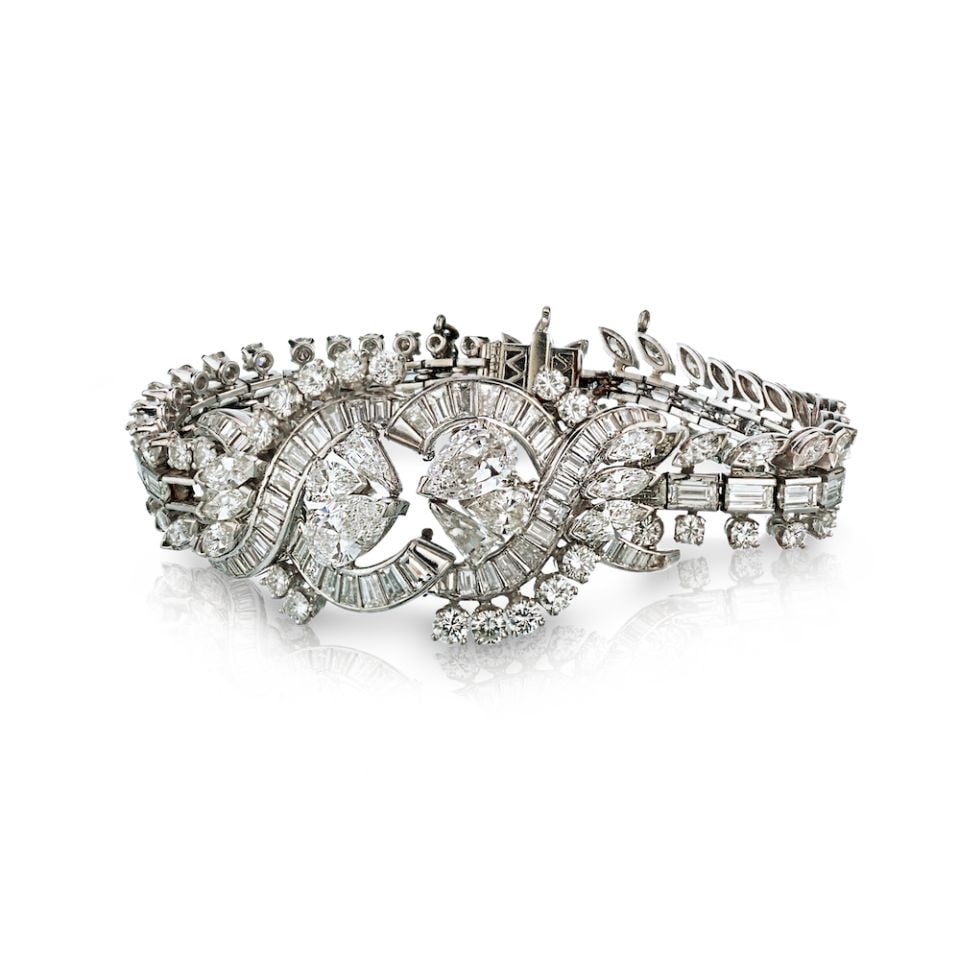 Vintage Platinum Bracelet 21 Carat Pear Marquise Baguette Diamonds 1970s: Vintage Platinum Bracelet 21 Carat Pear Marquise Baguette Diamonds 1970s This exquisite vintage bracelet features a stunning combination of pear, marquise, and baguette cut diamonds, with a total appr