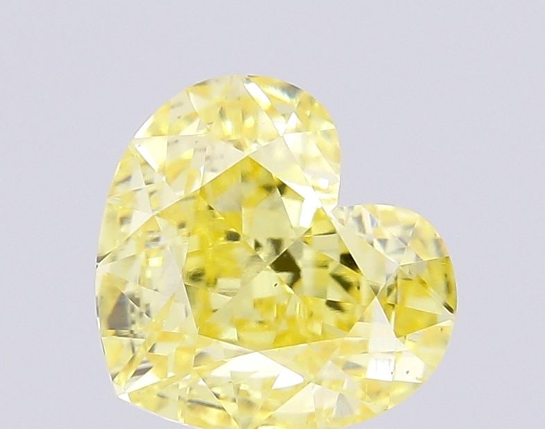 Loose Diamond - HEART 1.79ct Fancy Intense Yellow VS1: Loose Diamond - HEART 1.79ct Fancy Intense Yellow VS1 Source: This is a real non-mined Diamond that has been grown in a lab Shape: HEART Carats: 1.79 Color: Fancy Intense Yellow Certification: IGI Vid