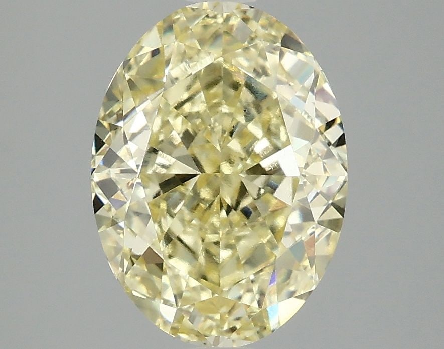 Loose Diamond - OVAL 3.1ct Fancy Vivid Yellow VS2: Loose Diamond - OVAL 3.1ct Fancy Vivid Yellow VS2 Source: This is a real non-mined Diamond that has been grown in a lab Shape: OVAL Carats: 3.1 Color: Fancy Vivid Yellow Certification: IGI Video: