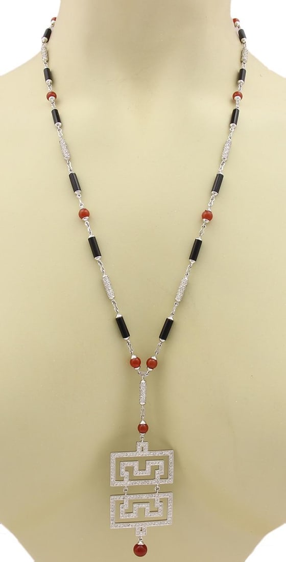 Stunning 5.45ct Diamond 18k White Gold Maze Pendant Necklace: Stunning 5.45ct Diamond 18k White Gold Maze Pendant Necklace This exquisite pendant and chain necklace is crafted from high-quality 18k white gold with a polished finish. The pendant features a unique