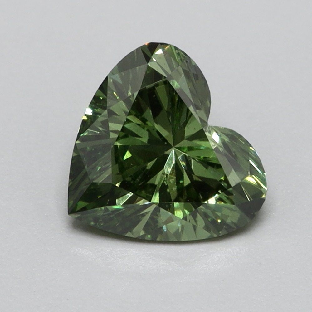 Loose Diamond - HEART 0.51ct Fancy Vivid Green VS2: Loose Diamond - HEART 0.51ct Fancy Vivid Green VS2 Source: This is a real non-mined Diamond that has been grown in a lab Shape: HEART Carats: 0.51 Color: Fancy Vivid Green Certification: NONE Video:
