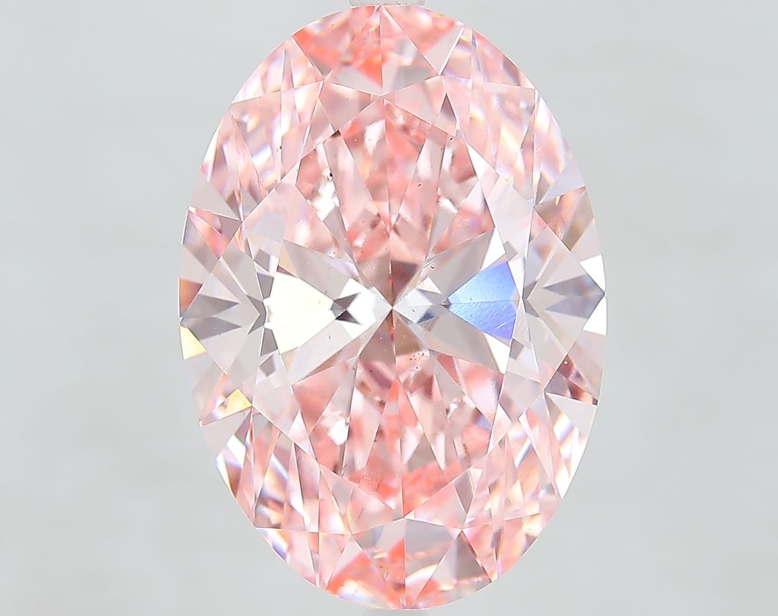 Loose Diamond - OVAL 10.09ct Fancy Vivid Pink VS2: Loose Diamond - OVAL 10.09ct Fancy Vivid Pink VS2 Source: This is a real non-mined Diamond that has been grown in a lab Shape: OVAL Carats: 10.09 Color: Fancy Vivid Pink Certification: IGI Video: