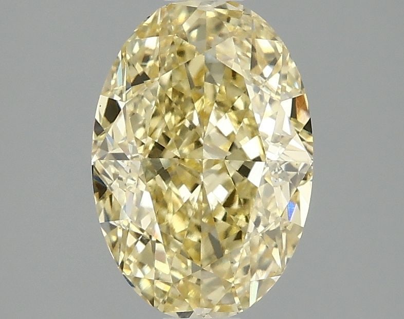 Loose Diamond - OVAL 2.05ct Fancy Intense Yellow VS1: Loose Diamond - OVAL 2.05ct Fancy Intense Yellow VS1 Source: This is a real non-mined Diamond that has been grown in a lab Shape: OVAL Carats: 2.05 Color: Fancy Intense Yellow Certification: IGI Video