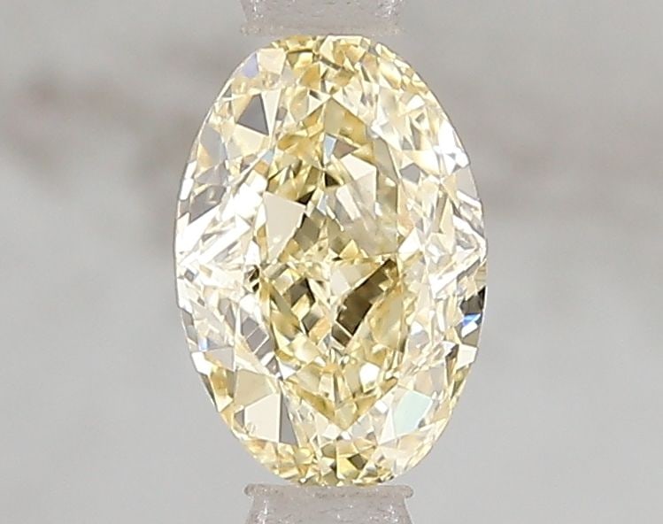 Loose Diamond - OVAL 1.02ct Fancy Intense Yellow VS2: Loose Diamond - OVAL 1.02ct Fancy Intense Yellow VS2 Source: This is a real non-mined Diamond that has been grown in a lab Shape: OVAL Carats: 1.02 Color: Fancy Intense Yellow Certification: IGI Video