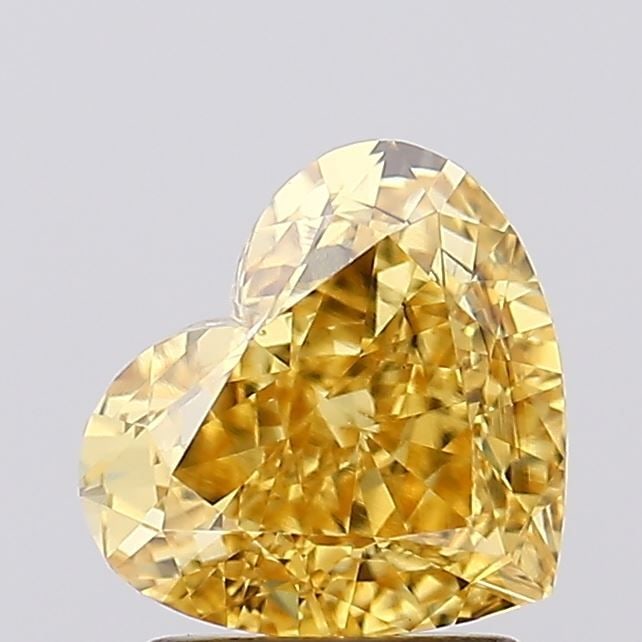 Loose Diamond - HEART 2.01ct Fancy Vivid Yellow VS2: Loose Diamond - HEART 2.01ct Fancy Vivid Yellow VS2 Source: This is a real non-mined Diamond that has been grown in a lab Shape: HEART Carats: 2.01 Color: Fancy Vivid Yellow Certification: IGI Video: