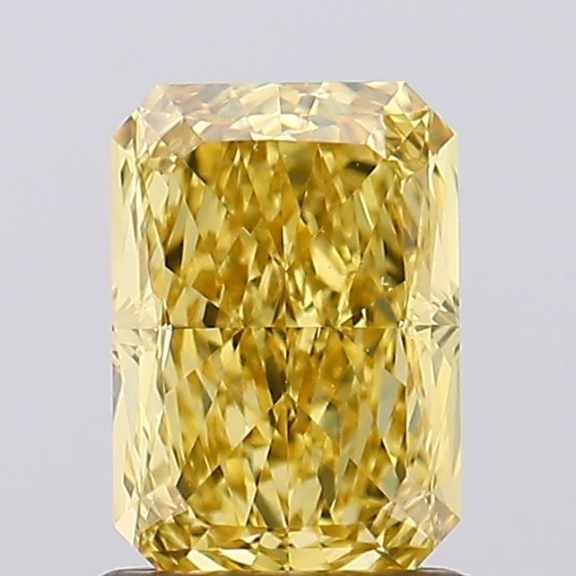 Loose Diamond - RADIANT 1.21ct Fancy Vivid Yellow VS1: Loose Diamond - RADIANT 1.21ct Fancy Vivid Yellow VS1 Source: This is a real non-mined Diamond that has been grown in a lab Shape: RADIANT Carats: 1.21 Color: Fancy Vivid Yellow Certification: IGI Vid