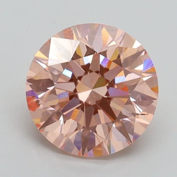 Loose Diamond - ROUND 1.5ct Fancy Intense Pink SI1: Loose Diamond - ROUND 1.5ct Fancy Intense Pink SI1 Source: This is a real non-mined Diamond that has been grown in a lab Shape: ROUND Carats: 1.5 Color: Fancy Intense Pink Certification: IGI Video:
