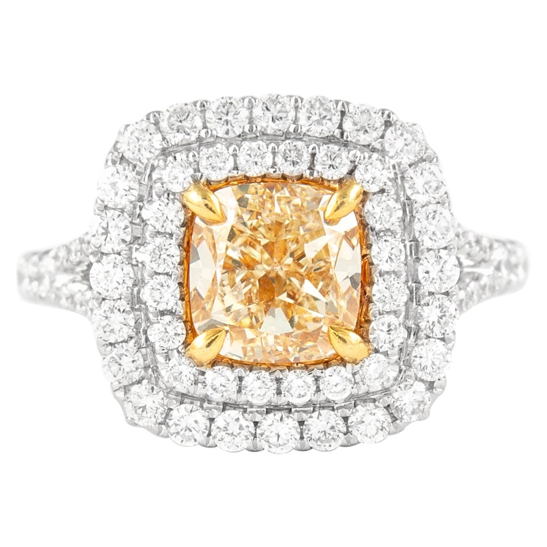 2.02ct Fancy Intense Yellow Diamond Ring 18k Gold EGL Certified: 2.02ct Fancy Intense Yellow Diamond Ring 18k Gold EGL Certified This exquisite ring features a stunning 2.02 ct fancy intense yellow diamond, graded VS2 clarity, set in a beautiful two-tone 18k gold d