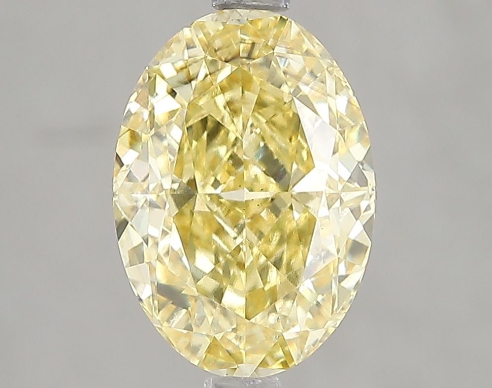 Loose Diamond - OVAL 3.02ct Fancy Intense Yellow SI1: Loose Diamond - OVAL 3.02ct Fancy Intense Yellow SI1 Source: This is a real non-mined Diamond that has been grown in a lab Shape: OVAL Carats: 3.02 Color: Fancy Intense Yellow Certification: IGI Video