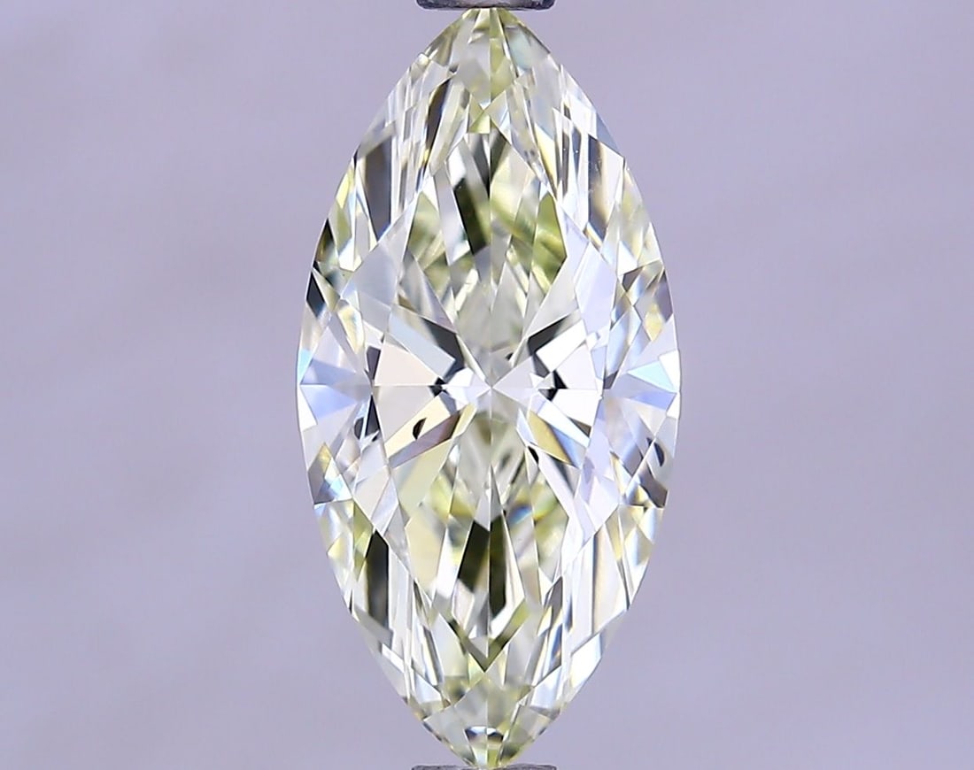 Loose Diamond - MARQUISE 1.44ct Fancy Yellow SI1: Loose Diamond - MARQUISE 1.44ct Fancy Yellow SI1 Source: This is a real non-mined Diamond that has been grown in a lab Shape: MARQUISE Carats: 1.44 Color: Fancy Yellow Certification: IGI Video:
