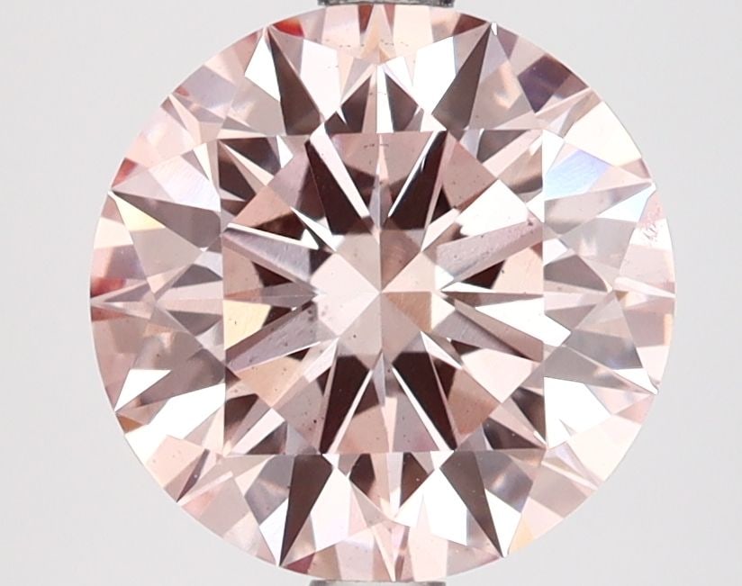 Ideal Loose Diamond - ROUND 2.6ct Fancy Pink VS2: Ideal Loose Diamond - ROUND 2.6ct Fancy Pink VS2 Source: This is a real non-mined Diamond that has been grown in a lab Shape: ROUND Carats: 2.6 Color: Fancy Pink Certification: IGI Video: