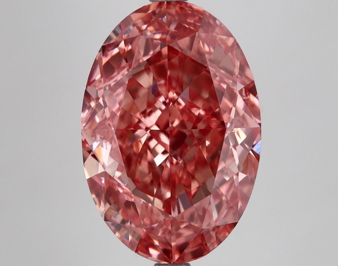 Loose Diamond - OVAL 8.02ct Fancy Vivid Orange Pink VS1: Loose Diamond - OVAL 8.02ct Fancy Vivid Orange Pink VS1 Source: This is a real non-mined Diamond that has been grown in a lab Shape: OVAL Carats: 8.02 Color: Fancy Vivid Orange Pink Certification: IGI