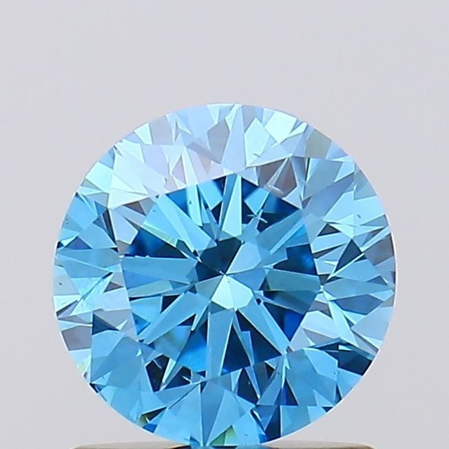 Loose Diamond - ROUND 1.09ct Fancy Vivid Blue SI1: Loose Diamond - ROUND 1.09ct Fancy Vivid Blue SI1 Source: This is a real non-mined Diamond that has been grown in a lab Shape: ROUND Carats: 1.09 Color: Fancy Vivid Blue Certification: IGI Video: