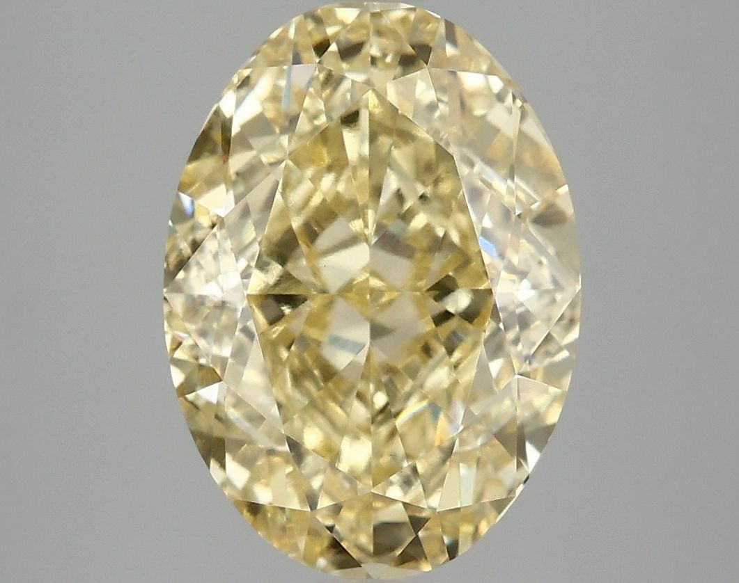 Loose Diamond - OVAL 4.05ct Fancy Vivid Yellow VS1: Loose Diamond - OVAL 4.05ct Fancy Vivid Yellow VS1 Source: This is a real non-mined Diamond that has been grown in a lab Shape: OVAL Carats: 4.05 Color: Fancy Vivid Yellow Certification: IGI Video: