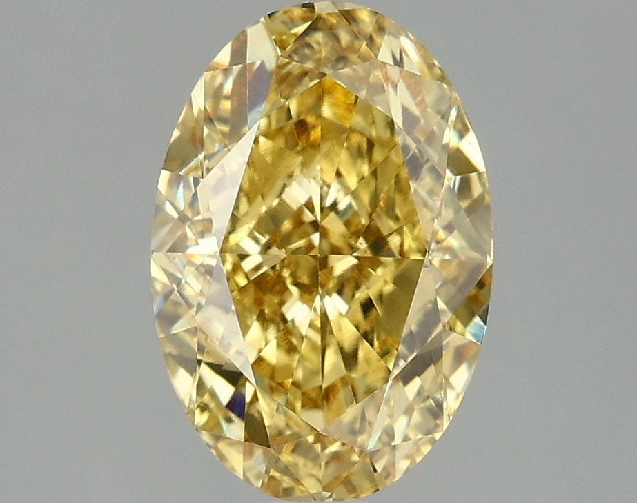 Loose Diamond - OVAL 3.09ct Fancy Vivid Yellow VS1: Loose Diamond - OVAL 3.09ct Fancy Vivid Yellow VS1 Source: This is a real non-mined Diamond that has been grown in a lab Shape: OVAL Carats: 3.09 Color: Fancy Vivid Yellow Certification: IGI Video: