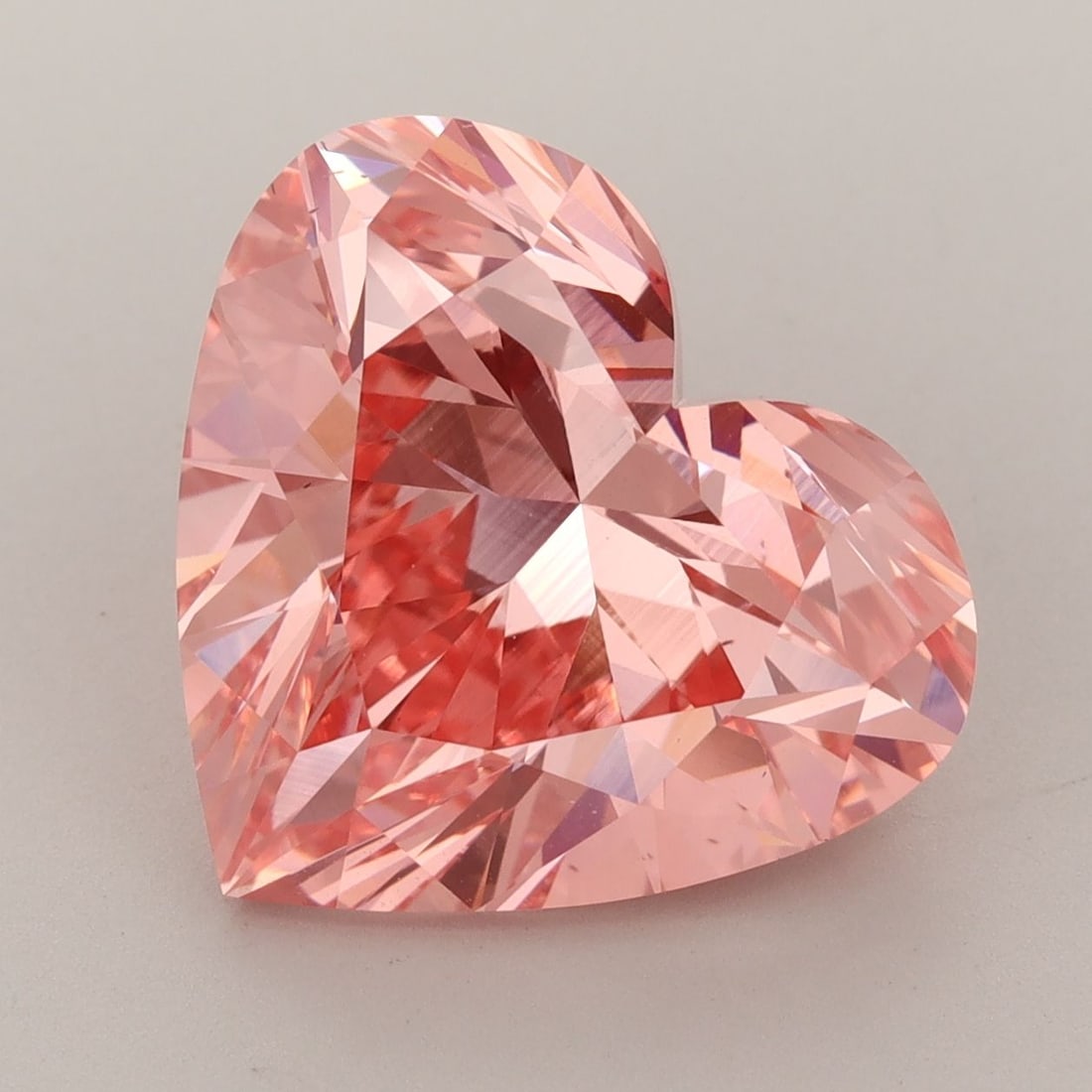Loose Diamond - HEART 8.16ct Fancy Vivid Pink VS1: Loose Diamond - HEART 8.16ct Fancy Vivid Pink VS1 Source: This is a real non-mined Diamond that has been grown in a lab Shape: HEART Carats: 8.16 Color: Fancy Vivid Pink Certification: IGI Video: