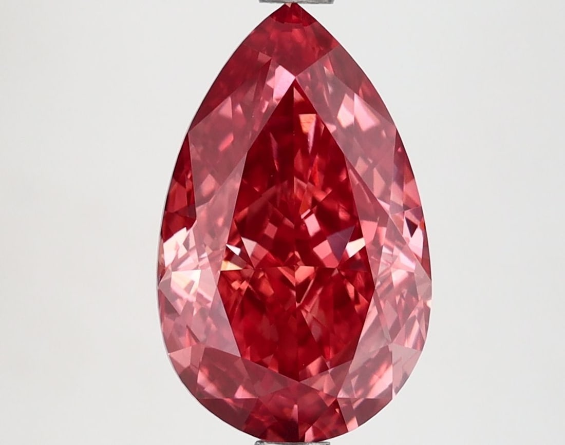 Loose Diamond - PEAR 3.13ct Fancy Vivid Pink VS1: Loose Diamond - PEAR 3.13ct Fancy Vivid Pink VS1 Source: This is a real non-mined Diamond that has been grown in a lab Shape: PEAR Carats: 3.13 Color: Fancy Vivid Pink Certification: IGI Video: