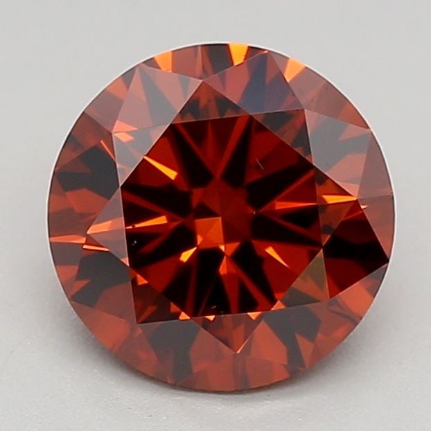 Loose Diamond - ROUND 0.96ct Fancy Orange VS2: Loose Diamond - ROUND 0.96ct Fancy Orange VS2 Source: This is a real non-mined Diamond that has been grown in a lab Shape: ROUND Carats: 0.96 Color: Fancy Orange Certification: IGI Video: